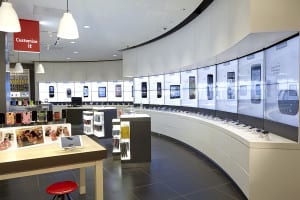 Device Wall: A visually stunning yet practical digital wall display presents devices side by side versus traditional groupings found in other stores.