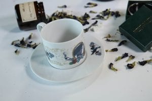 victorian tea set with scattered tea leaves HBO The Nevers