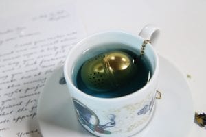 A golden tea egg with instructions HBO The Nevers