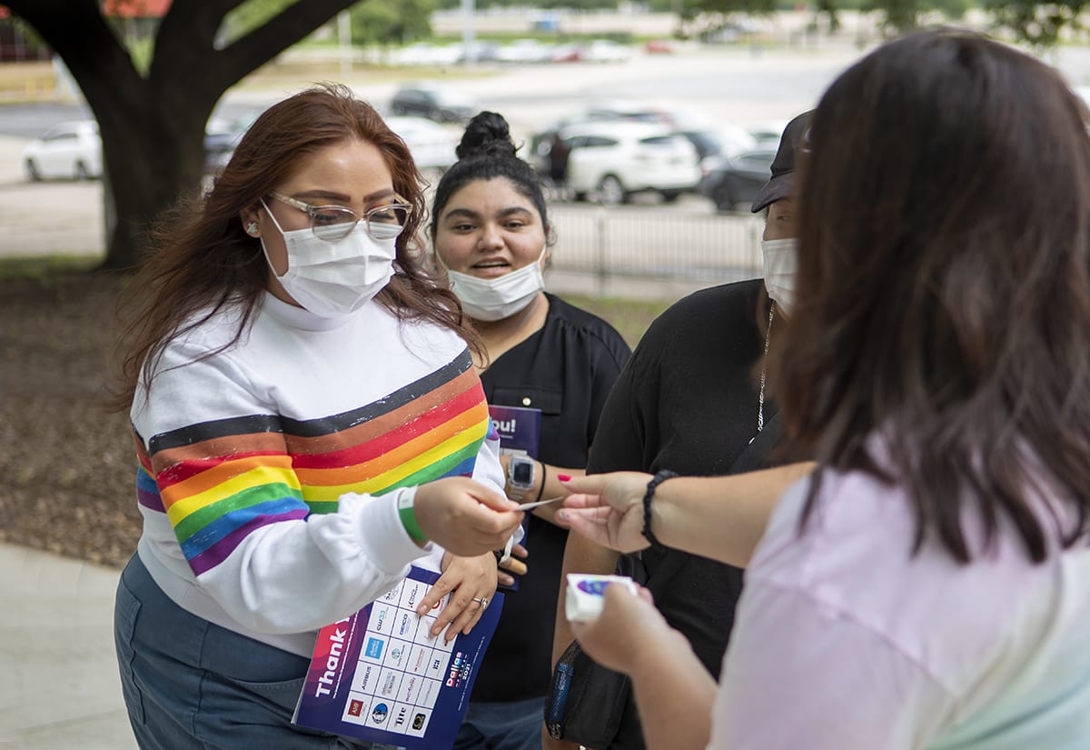 match-pride-2021-woman receives sticker