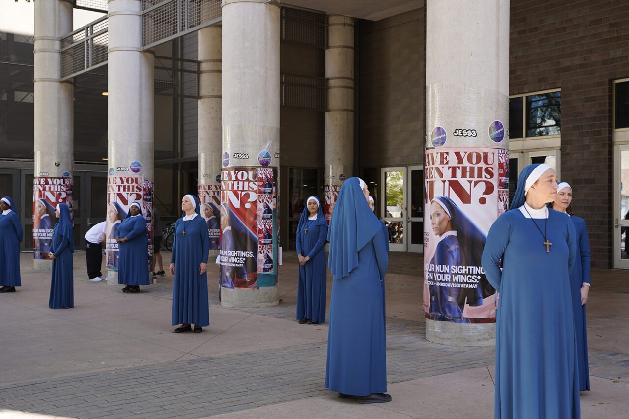 Nuns cross the street in downtown Austin at sxsw 2023_peacock activation