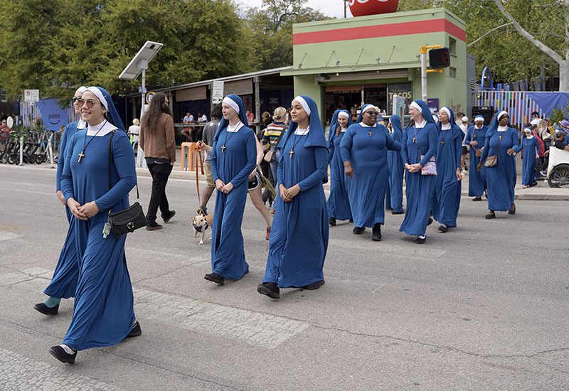 Nuns cross the street in downtown Austin