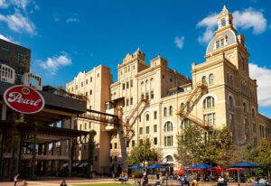 San Antonio, Texas, USA- January 31, 2020. Exterior of Emma Hotel, located on the grounds of Pearl Brewery. Large, 22 acres estate is the home of all year around farmers market, Culinary Institute of America and various restaurants and tourist venues. Emma hotel is named after Emma Koehler, wife of Pearl president Otto Koehler died in 1914. Emma ran the brewery after her husband died in 1914. Hotel building is part of the old brewery's architecture.