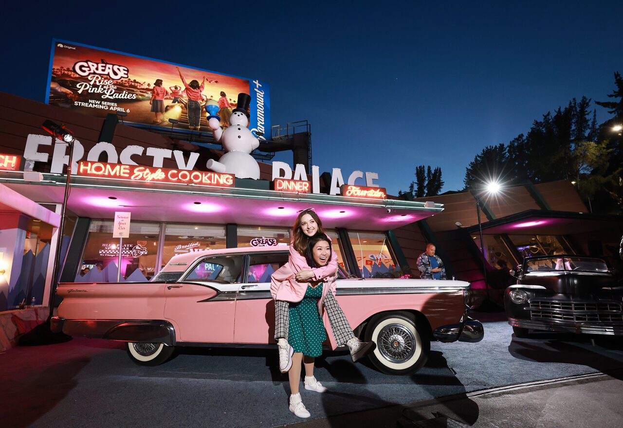 APRIL 06: Tricia Fukuhara (R) and guest attend The Frosty Palace: a pop-up experience celebrating Paramount+ original series "Grease: Rise of the Pink Ladies" on April 06, 2023 in West Hollywood, California. (Photo by Matt Winkelmeyer/Getty Images for PopSugar & Paramount+ Pop-Up by Grease: Rise of the Pink Ladies)