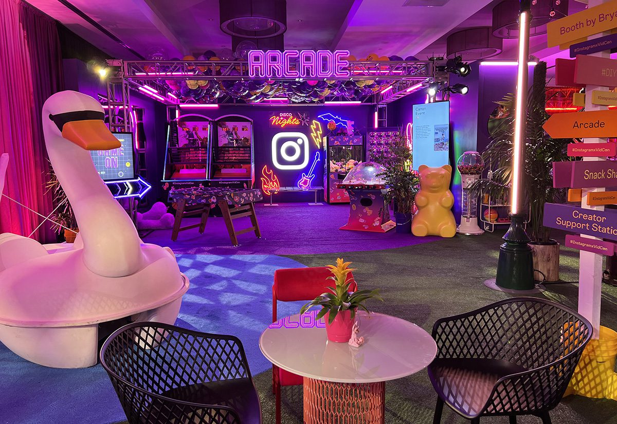 Meta's Instagram Creator Lounge full of whimsical props like a swan boat and arcade