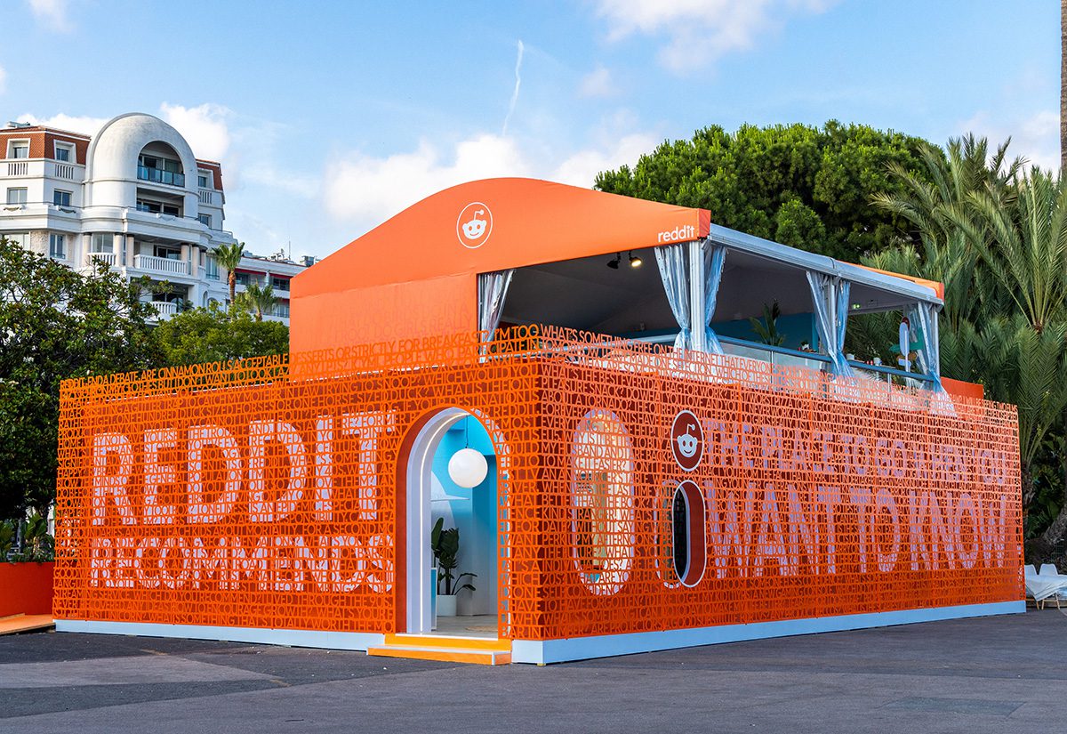 Reddit's red-orange booth at Cannes Lions 2023