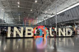 Two women in front of the INBOUND sign