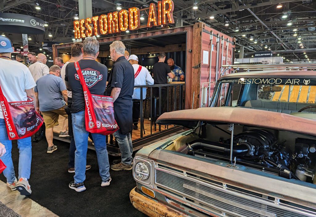 SEMA 23_Restomod Air rusty shipping container booth