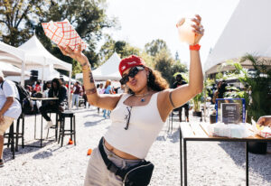 max X Nike_Yardrunners_2023 tailgate_attendee with food