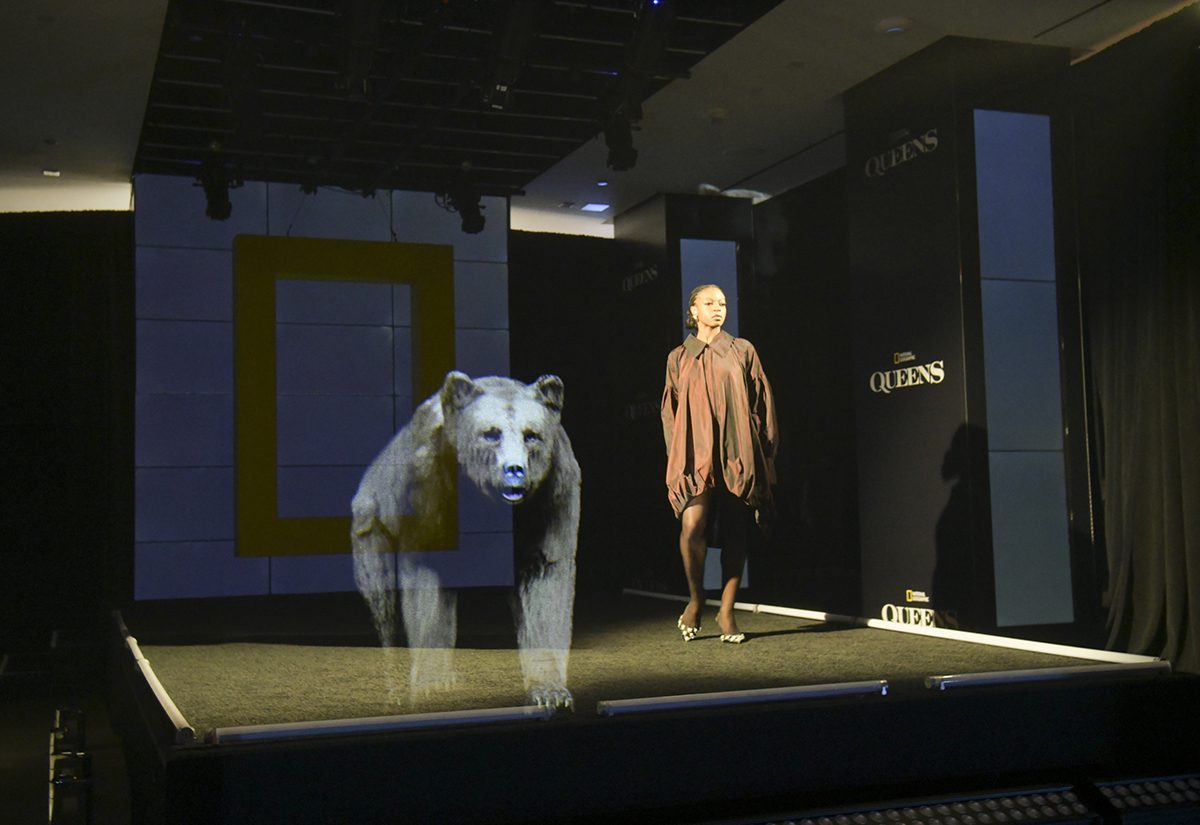 nat geo nyfw 2024 queens bear hologram with model