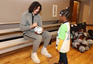 Netflix_All-Star 2024_Avatar Air Bender_player signing ball for kid