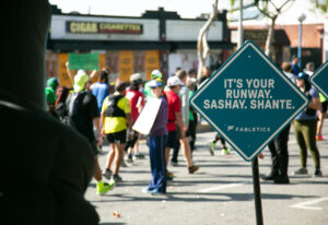 fab daddy fabletics_la marathon 2024_sashay sign