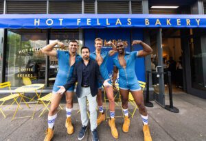 Hot Fellas with Mario Cantone in front of the bakery