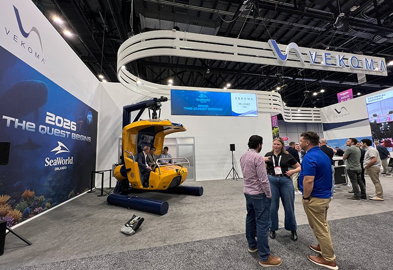 Vekoma booth with SeaWorld vehicle