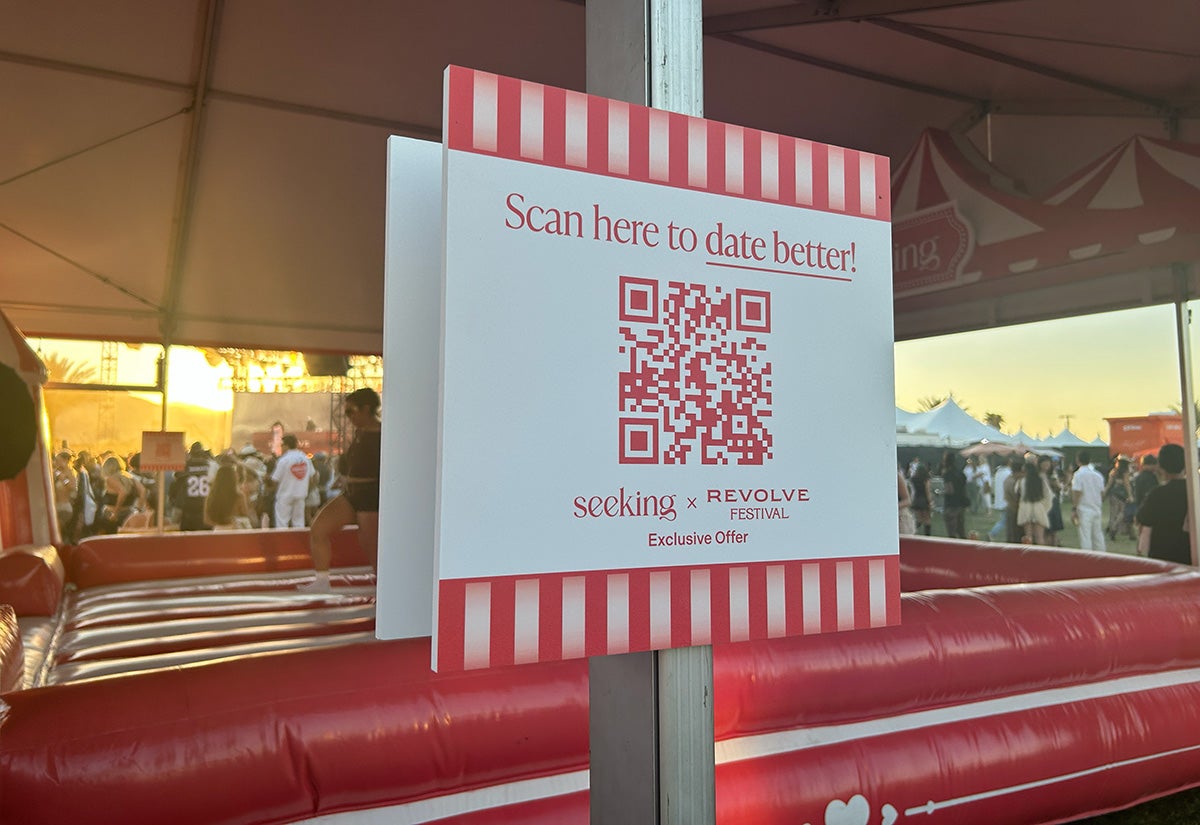 sign of Seeking's Revolve booth